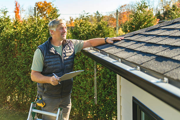 Professional Roofing technician working in Hingham, MA
